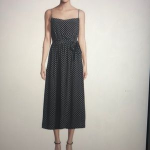 Navy poke a dot midi length with spaghetti straps